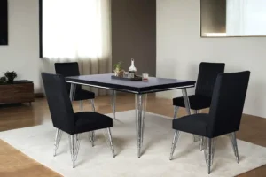 Ava Dining Collection with black table, chrome legs, and upholstered velvet chairs by New Classic Furniture