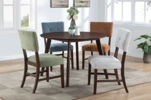 Tioga Dining Collection in warm cherry finish with round table and upholstered chairs by New Classic Furniture