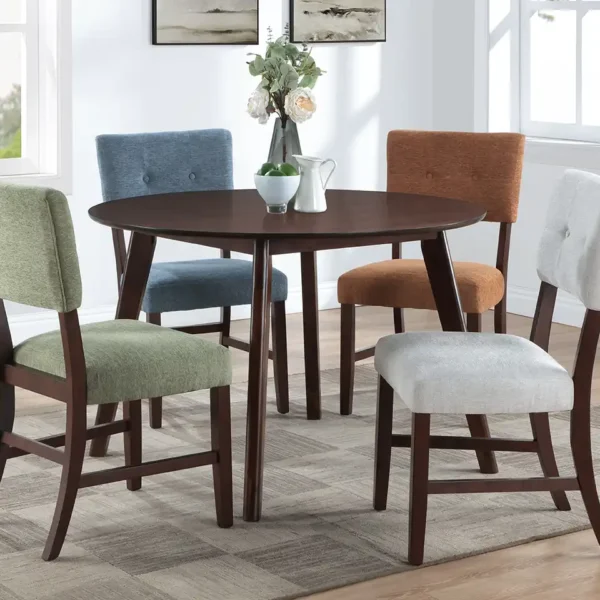 Tioga Dining Collection in warm cherry finish with round table and upholstered chairs by New Classic Furniture